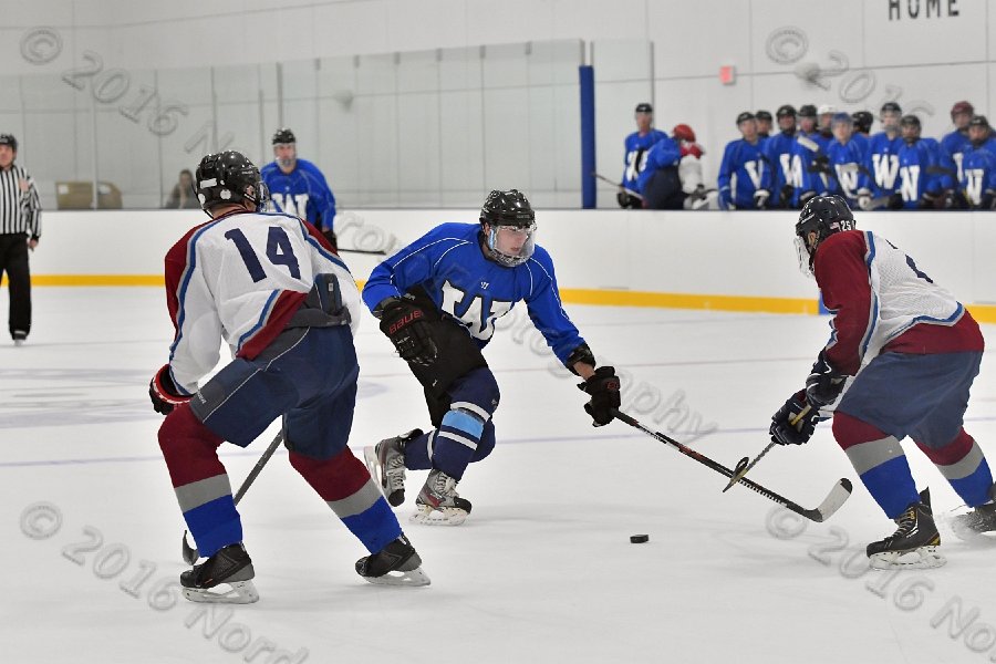 Wheaton College Men\'s Ice Hockey vs Middlesex Community College. - Photo By: KEITH NORDSTROM